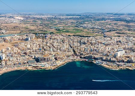 Aerial View Of Bugibba Town, St. Paul's Bay In The Northern Region, Malta. Popular Tourist Resort De