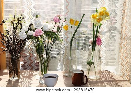 A Mug Of Milk, A Cup Of Corn And Cake On A Sunny Table, A Bouquet Of Spring Flowers For Mood, Diet F