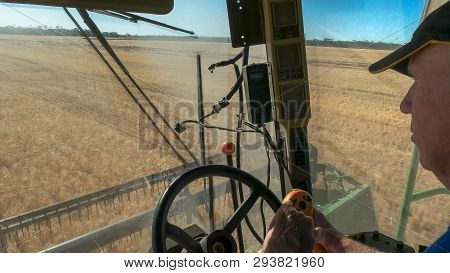 Hyden, Western Australia, Australia- November 4, 2015: A Inside The Cab View Of A Farmer Driving A H