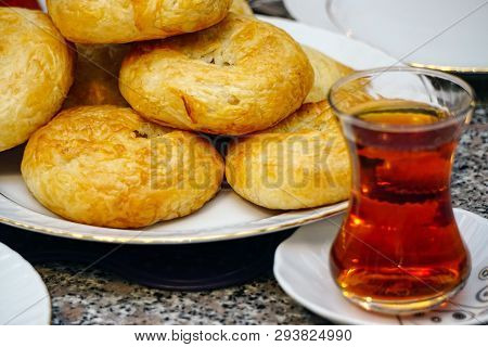 Traditional Smyrna Turkey Pastry Boyoz With Turkish Tea Close Up View