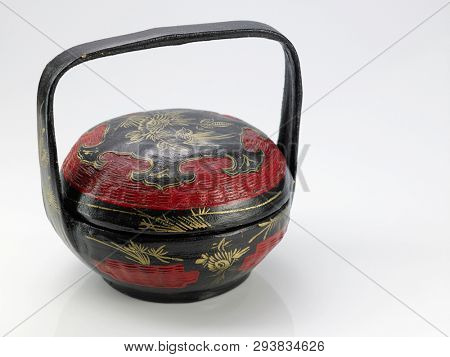 chinese traditional tiffin carrier basket on white background
