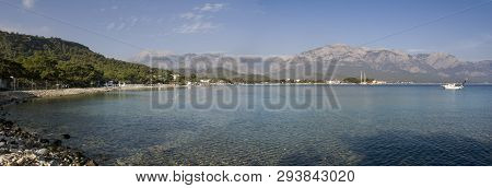 Kemer Antalia Nice View Of The Sea. Beach Kemer Antalia With Sand And Mountains, The Sea With The Sh