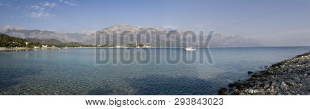 Kemer Antalia Nice View Of The Sea. Beach Kemer Antalia With Sand And Mountains, The Sea With The Sh