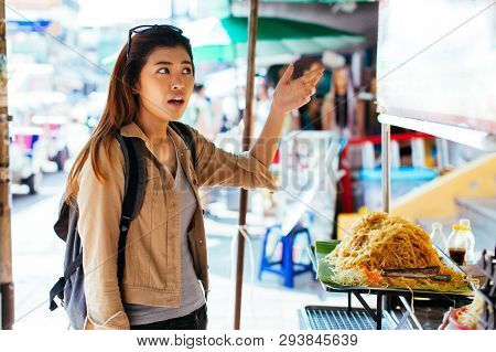 Young Asian Woman Tourist Getting Scammed And Unhappy With Overpriced Street Food In Thailand