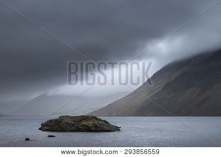 Beautiful Long Exposure Landscape Image Of Wast Water In Uk Lake District During Moody Spring Evenin
