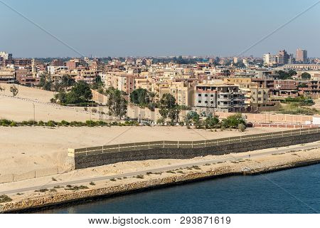 Ismailia, Egypt - November 5, 2017: Residential Buildings On The Shore Of Suez Canal In Suburb Of Is