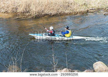 Grodno, Belarus - April, 2019: Kayak Freestyle Competition On Fast Cold Water River Strenuously Rowi