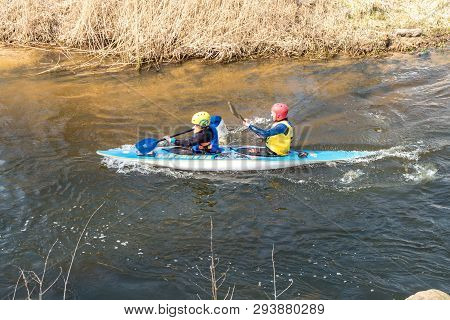 Grodno, Belarus - April, 2019: Kayak Freestyle Competition On Fast Cold Water River Strenuously Rowi