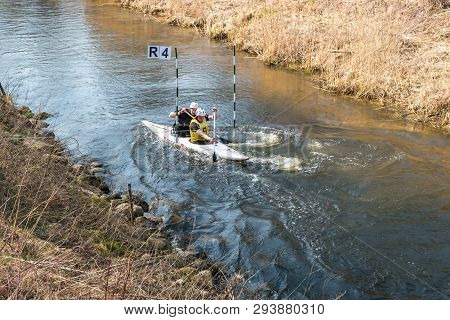 Grodno, Belarus - April, 2019: Kayak Freestyle Competition On Fast Cold Water River Strenuously Rowi