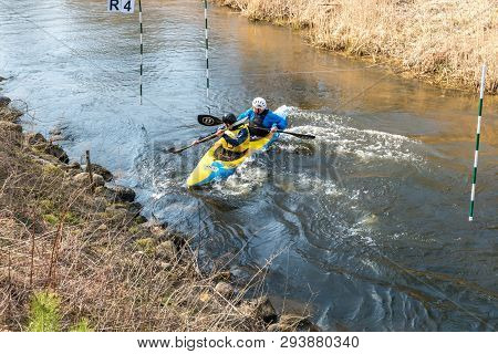 Grodno, Belarus - April, 2019: Kayak Freestyle Competition On Fast Cold Water River Strenuously Rowi