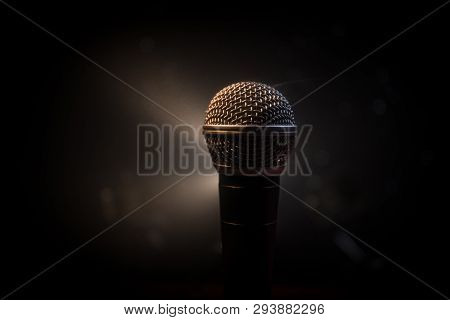 Microphone Karaoke, Concert . Vocal Audio Mic In Low Light With Blurred Background. Live Music, Audi