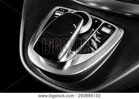 Media And Navigation Control Buttons Of A Modern Car. Car Interior Details. Brown Leather Interior W