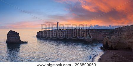 Sea Coast Sunset View With Lighthouse Of Ponta Do Altar. West View Over Praia Da Afurada Beach (ferr