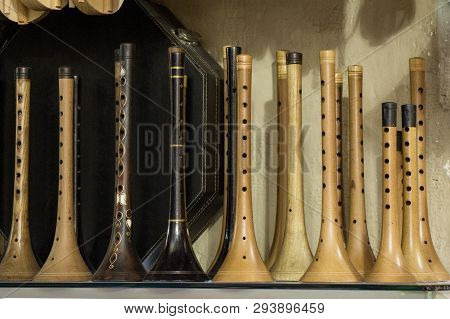 Dozens Of Handmade Wooden Flutes Or Shrill Pipe