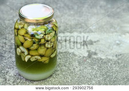 Preparing Green Walnut Liqueur. Making Nocino Liqueur