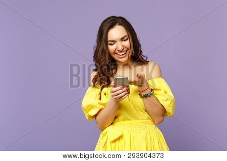 Laughing Young Woman In Yellow Summer Dress Using Mobile Phone, Typing Sms Message Isolated On Paste
