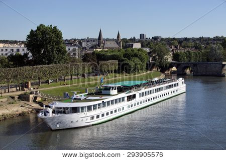 Cruise Harbor On River Seine In Poissy, Near Paris, Surrounded By Collegiate And Old Bombed Stone Br