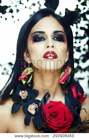 Pretty Brunette Woman With Rose Jewelry, Black And Red, Bright Make Up Kike A Vampire Closeup Red Li