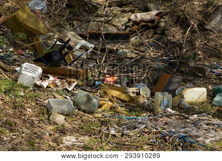 Mountain Garbage In The Forest. Garbage In The Forest -  Dump In The Woods.