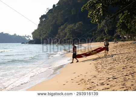 Ko Chang, Thailand - April 9, 2018: People Men Sweaming On A Kayak Boat - Beautiful Tropical Paradis