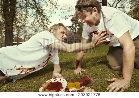 Men In Street Park Fighting After Eating Langos With Garlic, Ketchup And Cheese