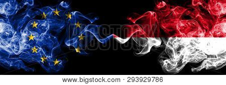 European Union Vs Monaco, Monacan Smoke Flags Placed Side By Side. Thick Colored Silky Smoke Flags O