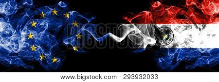 European Union Vs Paraguay, Paraguayan Smoke Flags Placed Side By Side. Thick Colored Silky Smoke Fl