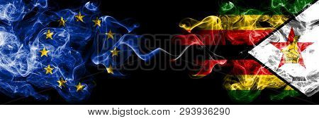European Union Vs Zimbabwe, Zimbabwean Smoke Flags Placed Side By Side. Thick Colored Silky Smoke Fl
