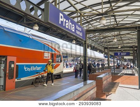 Prague, Czech Republic, March 23, 2019: People At The Train Platform Boarding And Leaving The Train 