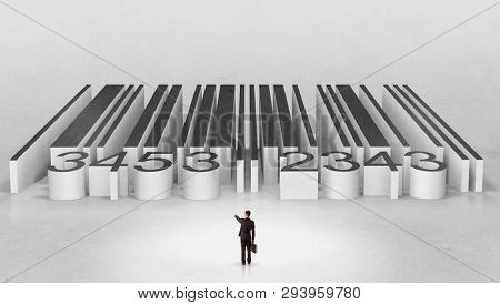 Young businessman standing in front of a big codebar