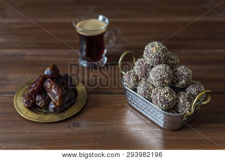 Dates And Oatmeal Energy Balls Or Bites No Cook With Espresso Black Coffee On Wooden Table Healthy F