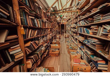 Kyiv, Ukraine - Apr 7, 2019: Abandoned Bookshelves In Old Market With Antique Magazines And Books On