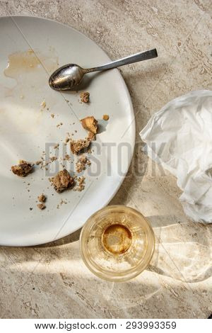 Dirty and empty dishes after breakfast and after party. Real life concept at home. 