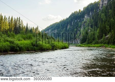 Stone Pillars On River Usva, Perm Region, Russia Bottom View On Natural Background. Text Copy Space.