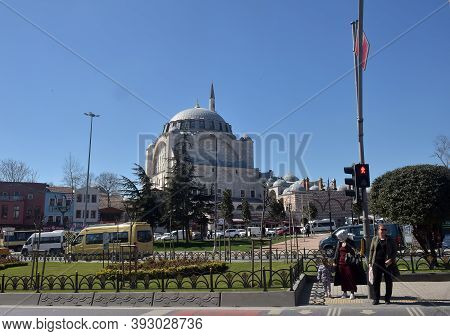 Turkey, Istanbul 14,03,2018 Mihrimah Sultan Mosque In Uskudar District. Muslims And Tourists Walk Th