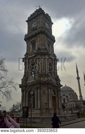 Turkey, Istanbul 20,03,2018  Clock Tower (saat Kulesi)) In Park Of Dolmabahce Palace (dolmabahce Sar