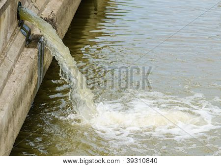 Flow Out Water From The Conduit To The River