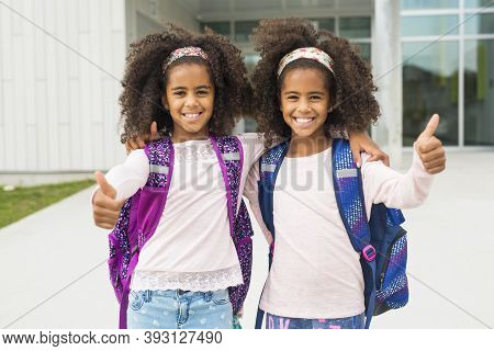 Two Nine Years Old Girl Student At School