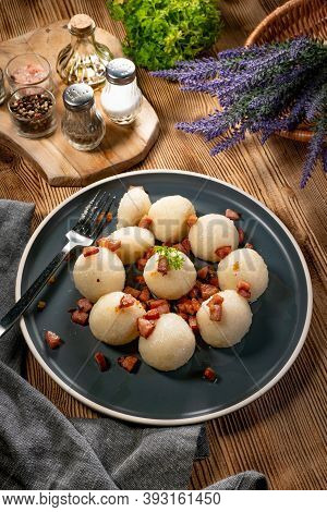 Meat Stuffed Potato Dumplings With Fried Onion And Greaves.