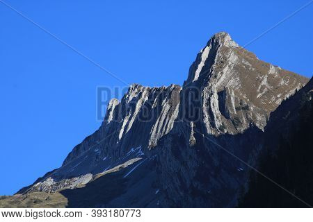 Visible Rock Layers On Mount Bockmattlistock. Mountain In Schwyz Canton.