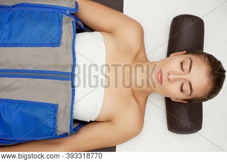 Young Woman Doing A Pressotherapy Treatment In A Clinic