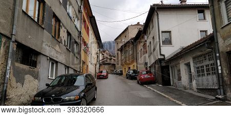 Sarajevo, Bosnia- March 8, 2020: Tourists Are Visiting Sebilj, Sarajevo Streets, Old Buildings, Tran