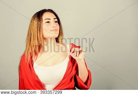 Street Style. Girl Stylish Hairstyle On Blue Background. Extra Volume. Hair Crimping Method Styling 