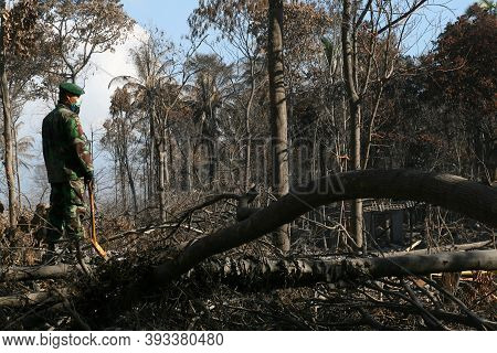 Yogyakarta, Indonesia. November 14, 2010: Mount Merapi Eruption, An Indonesian National Soldier Saw 