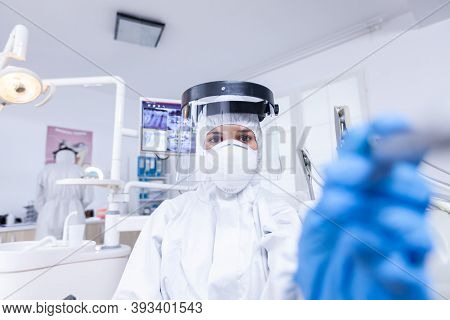 Dentist Pov Checking Patient Teeth Hygine Using Drill To Fix Dental Cavity. Stomatolog Wearing Safet