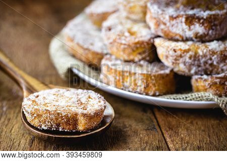 Fried Or Baked Bread With Cinnamon And Sugar In An Antique Copper Skimmer. Called Rabanada In Brazil