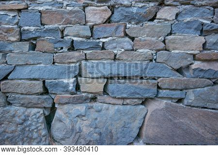 Castle Wall Made Of Old Stones. Castle Wall Made Of Old Stones Textures For Design And Photo Backgro