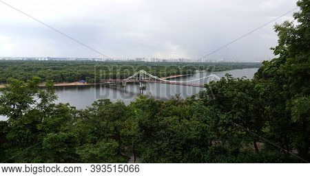 Kiev, Ukraine July 12, 2019: Park Pedestrian Bridge On Trukhanov Island In The City Of Kiev Ukraine