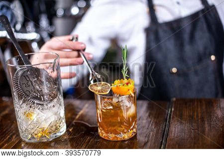 Girl Barman Makes A Cocktail In The Pothouse