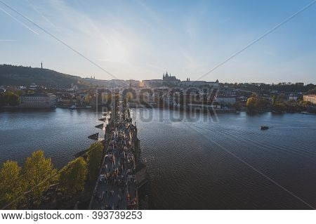 Prague, Charles Bridge, Vltava River And Prague Castle At Sunset